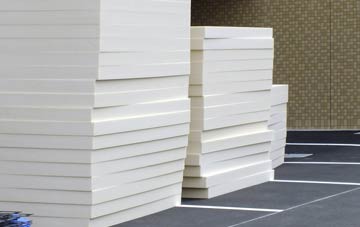 Settle flat roof insulation costs