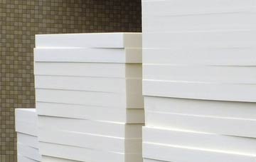 Settle tapered roof insulation costs